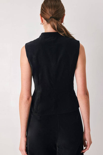 A velvet military style vest