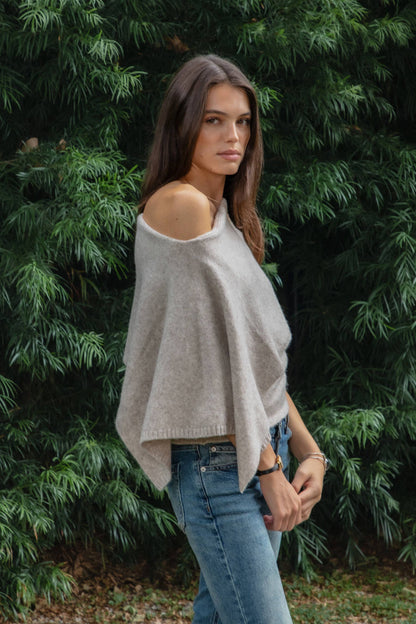 AINSLEY Off Shoulder Asymmetric Knit Poncho Sweater